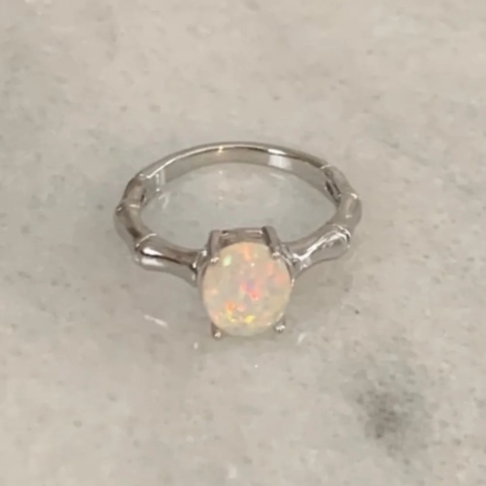 Silver Bamboo Opal Pendant Ring Size 6

Brand New - Picture 2 of 5